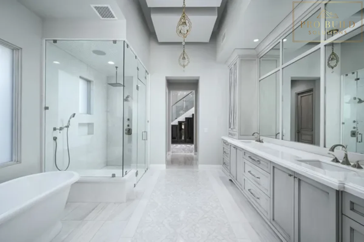 Bright luxury bathroom featuring a long double vanity, glass walk-in shower, freestanding tub, and polished spa-like design, Naperville, IL