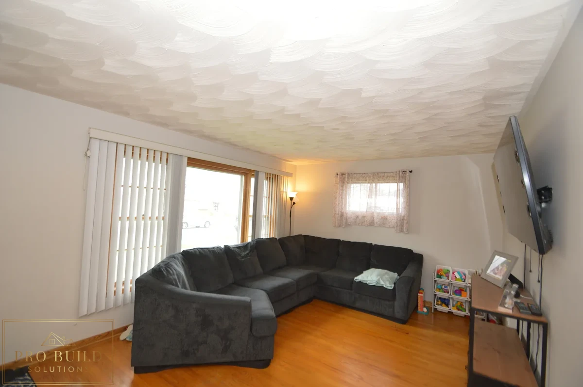 Living Room Original Flooring, Popcorn Ceiling, No Lighting, Western Springs