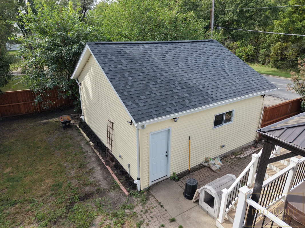 Completed garage side elevation after rebuild with updated exterior finishes, Wood Dale