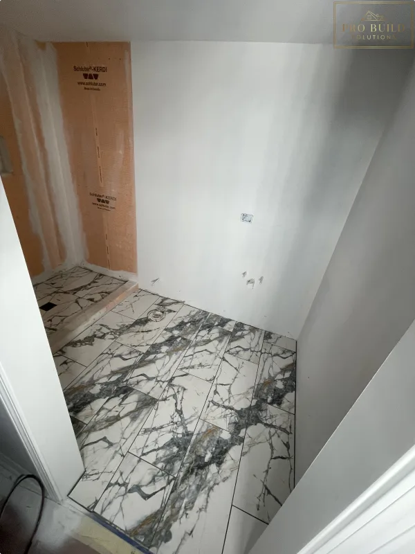 12"*24" Ceramic Tile Installed in Bathroom Floor with proper Kerdi Waterproofing, Itasca