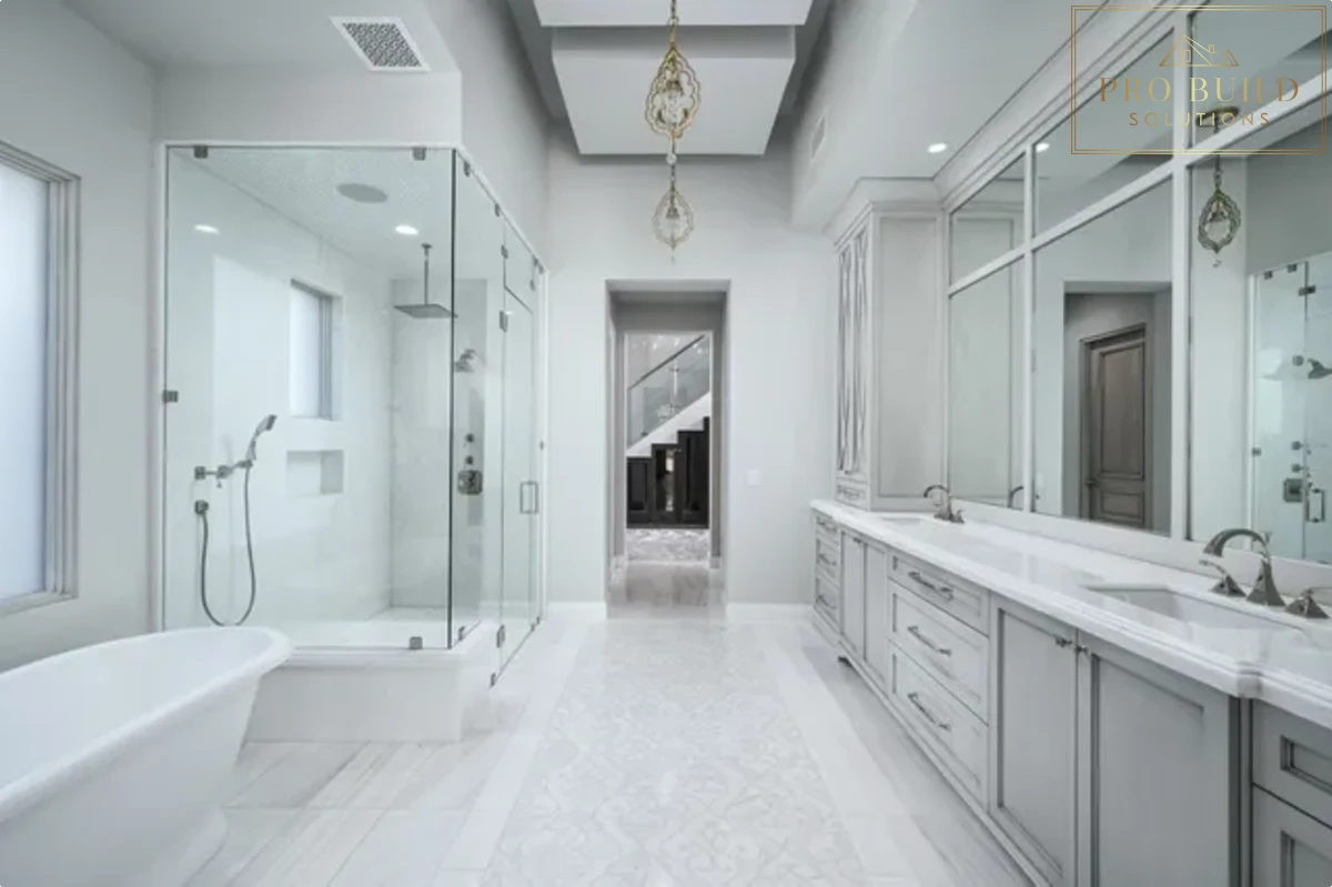Bright luxury bathroom featuring a long double vanity, glass walk-in shower, freestanding tub, and polished spa-like design, Naperville, IL