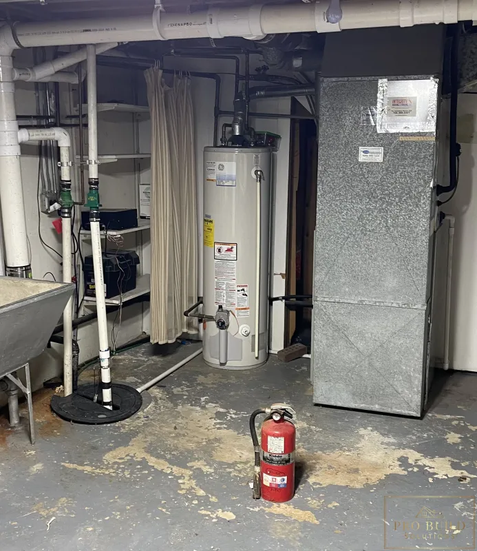 Views of the Open Mechanical Room before creating the proper room, Glen Ellyn, IL