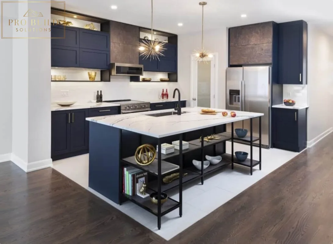Contemporary kitchen featuring dark blue cabinetry, white quartz island, stainless appliances, and sleek black shelving accents, Darien, IL