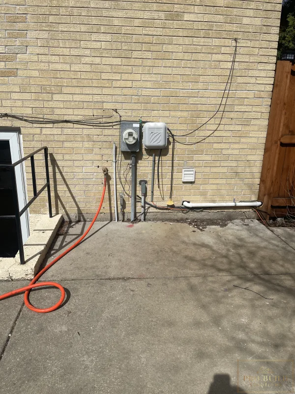 Existing underground electrical service equipment before 200-amp upgrade in Wood Dale, IL
