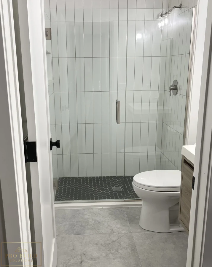 Updated bathroom design with walk-in shower, modern tile work, and clean neutral finishes, Claredon Hills