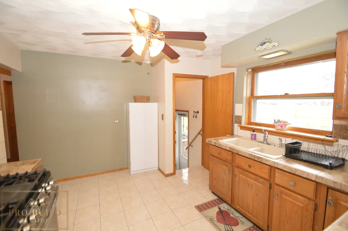 12*12 Ceramic Tile, Popcorn Ceiling, IKEA Cabinet, Ceramic Countertop, La Grange