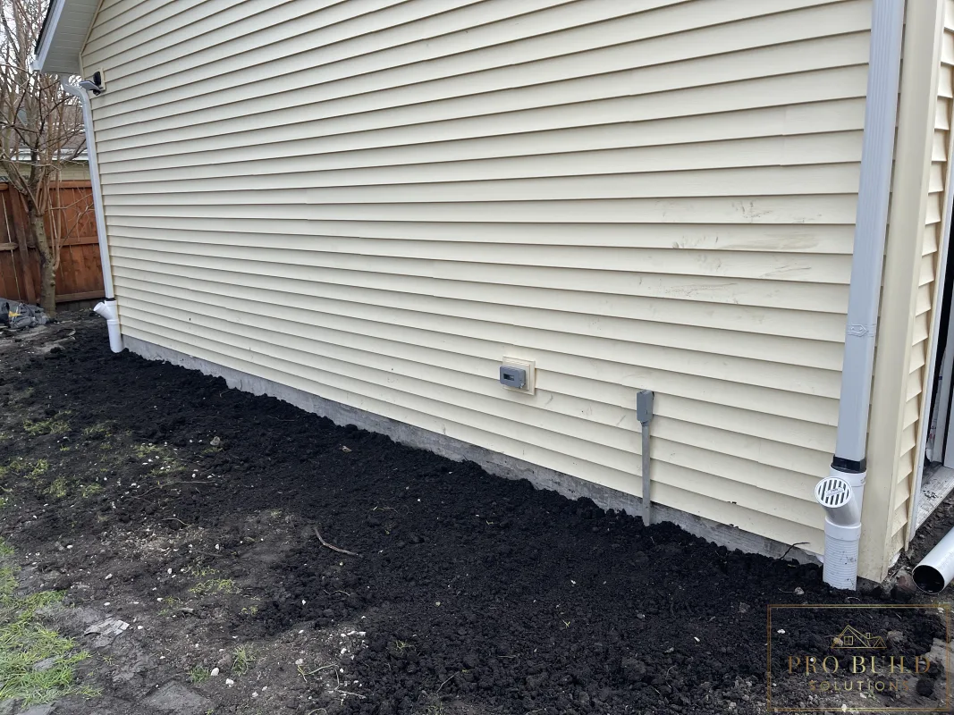 Drainage and grading work along new detached garage foundation, Wood Dale, IL