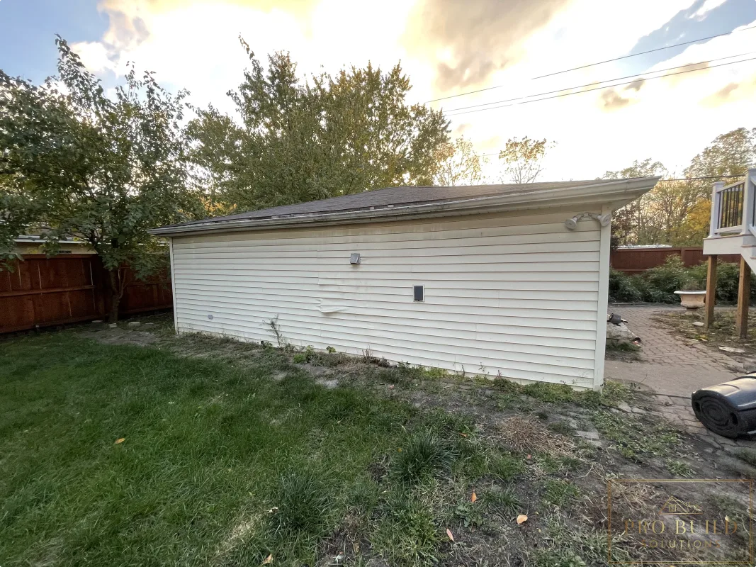 Existing garage exterior before structural rebuild and drainage improvements, Wood Dale