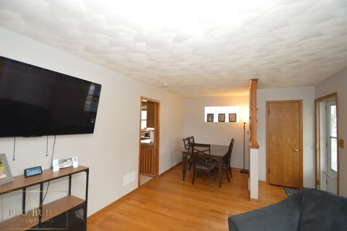 Dining Before: Popcorn Ceiling, Original Wornout Flooring 6*6 space, Western Springs