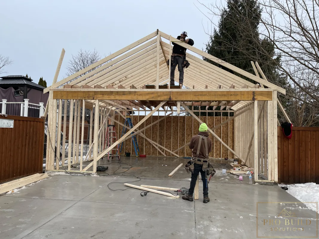 New garage framing with gable roof construction in progress, Wood Dale, IL