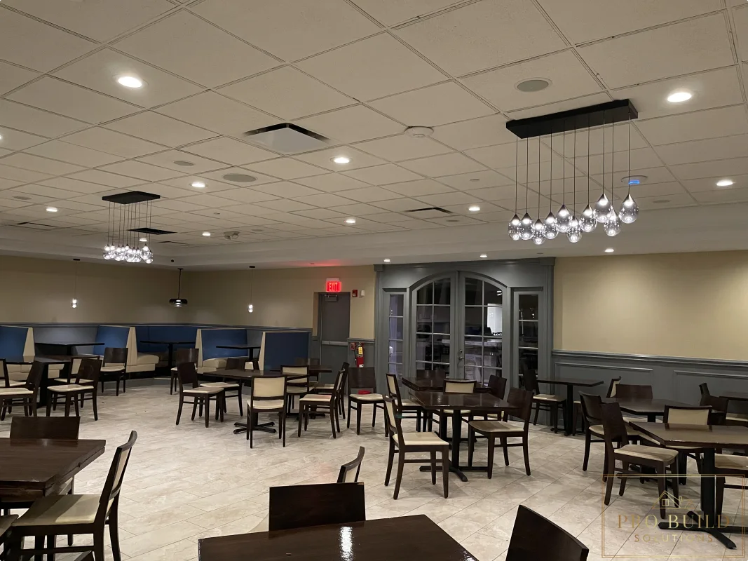 Restaurant dining area during commercial electrical and lighting upgrade, Schaumburg, IL