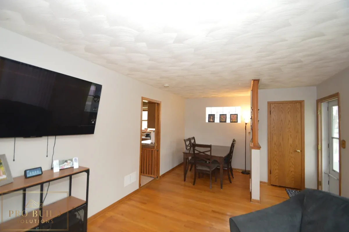 Dining Before: Popcorn Ceiling, Original Wornout Flooring 6*6 space, Western Springs