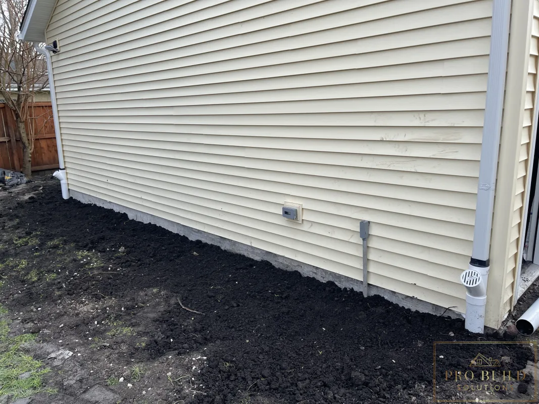 Drainage and grading work along new detached garage foundation, Wood Dale, IL