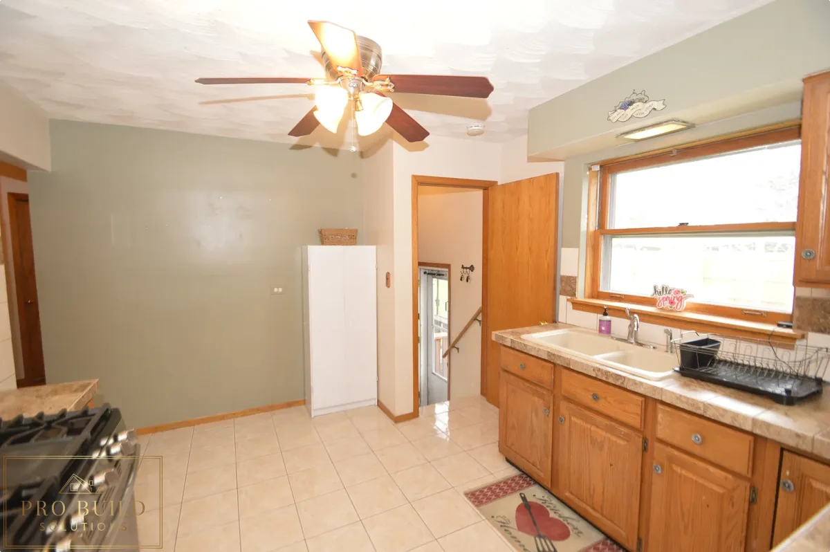 12*12 Ceramic Tile, Popcorn Ceiling, IKEA Cabinet, Ceramic Countertop, La Grange