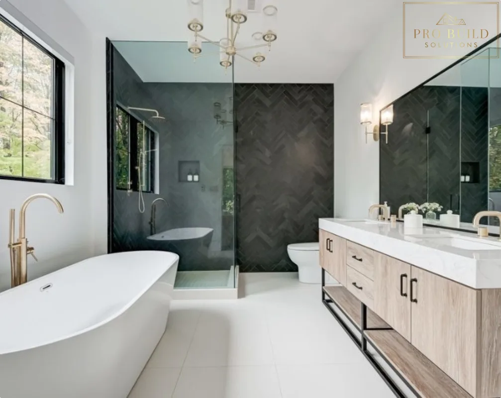Luxury modern spa bathroom with freestanding tub, black herringbone accent wall, glass shower, and light wood vanity, La Grange, IL