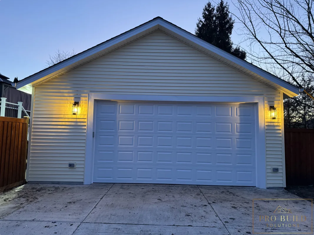 Completed detached garage with new driveway, lighting, and overhead garage door, Wood Dale, IL