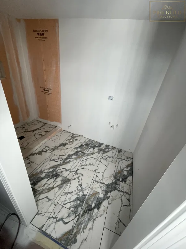 12"*24" Ceramic Tile Installed in Bathroom Floor with proper Kerdi Waterproofing, Itasca