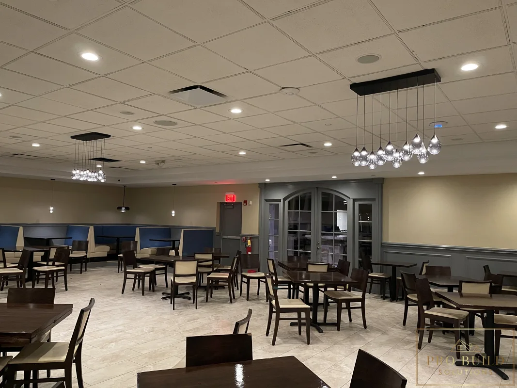 Restaurant dining area during commercial electrical and lighting upgrade, Schaumburg, IL