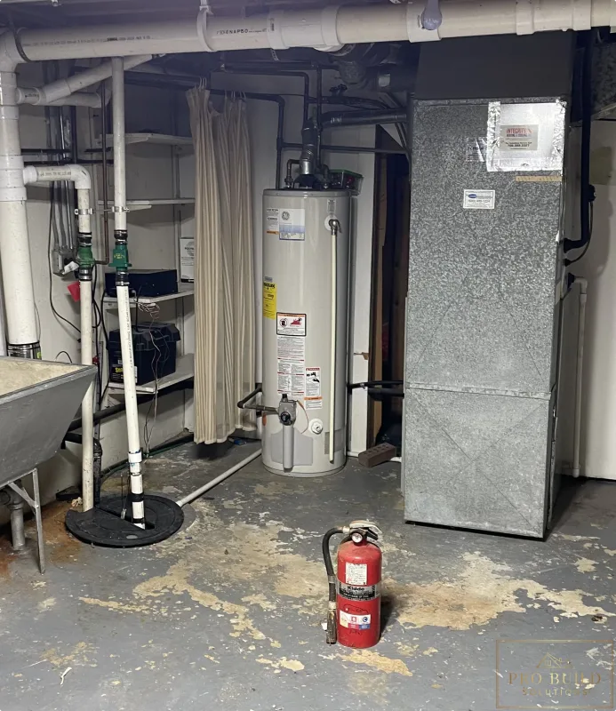 Views of the Open Mechanical Room before creating the proper room, Glen Ellyn, IL