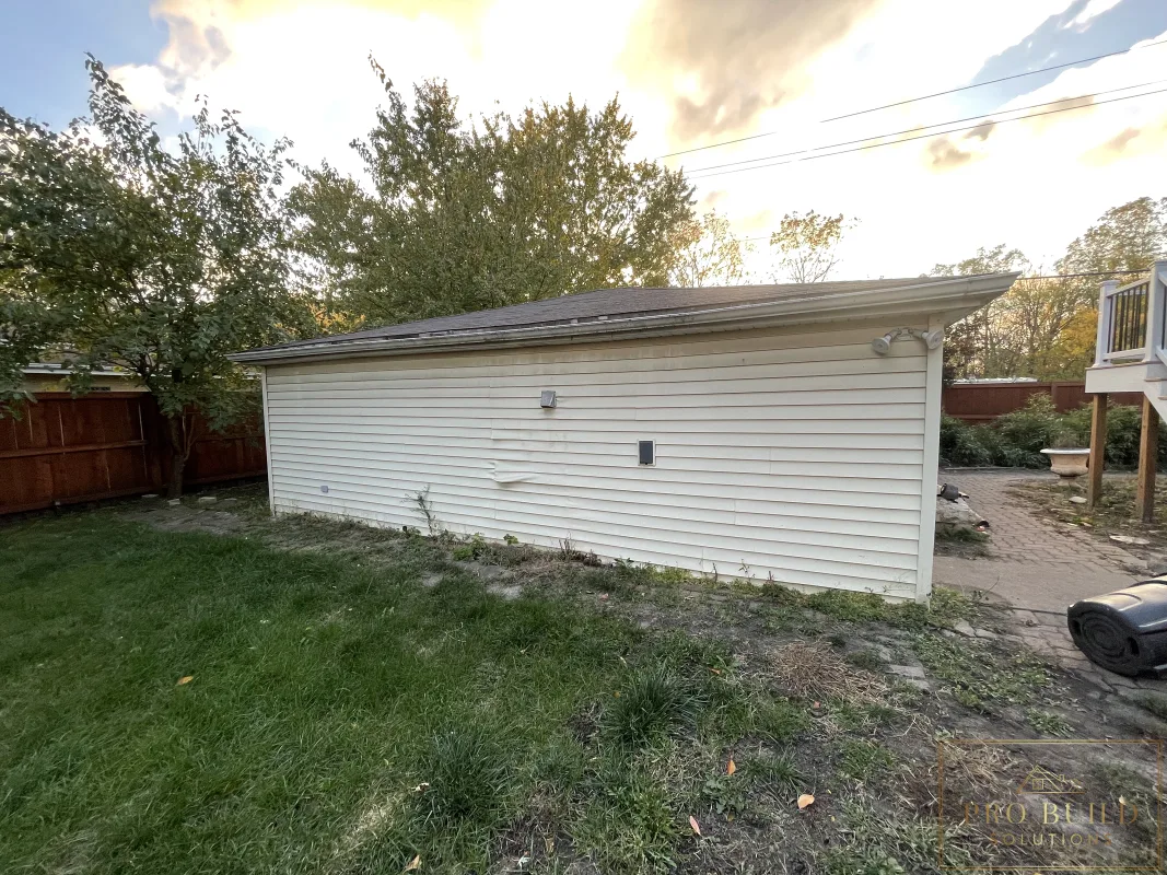 Existing garage exterior before structural rebuild and drainage improvements, Wood Dale