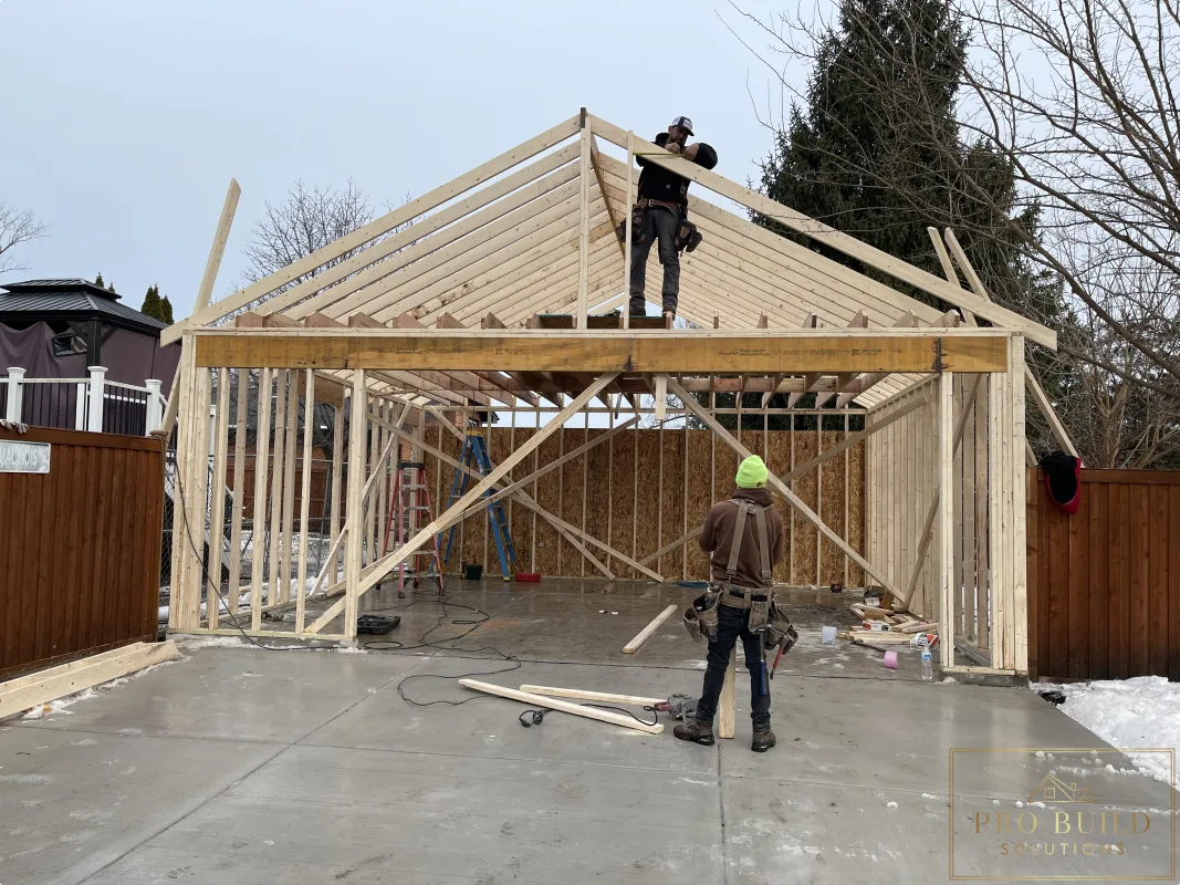 New garage framing with gable roof construction in progress, Wood Dale, IL