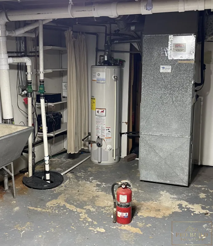 Views of the Open Mechanical Room before creating the proper room, Glen Ellyn, IL