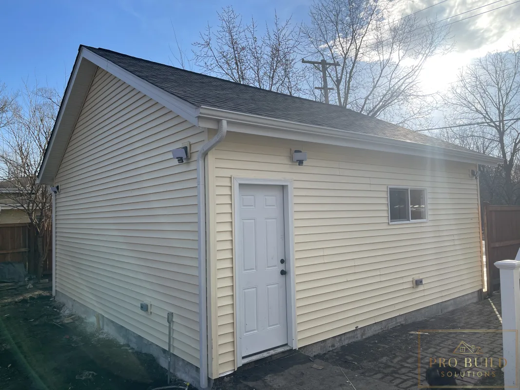 Completed garage side elevation after rebuild with updated exterior finishes, Wood Dale
