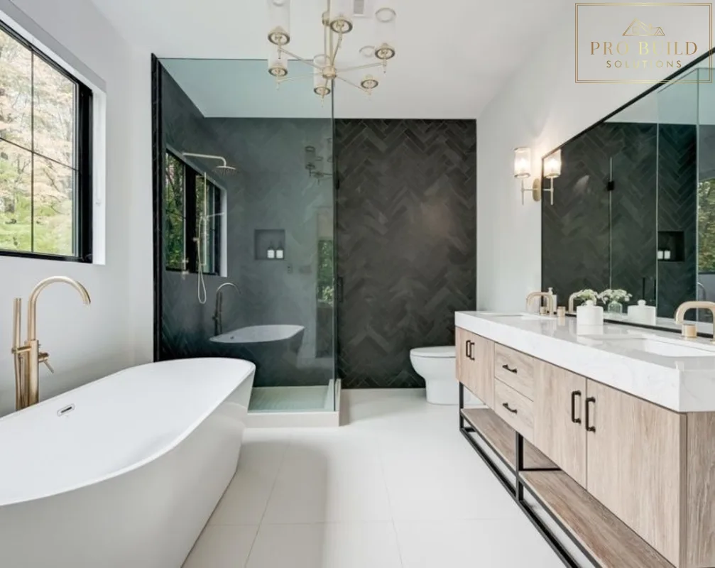 Luxury modern spa bathroom with freestanding tub, black herringbone accent wall, glass shower, and light wood vanity, La Grange, IL
