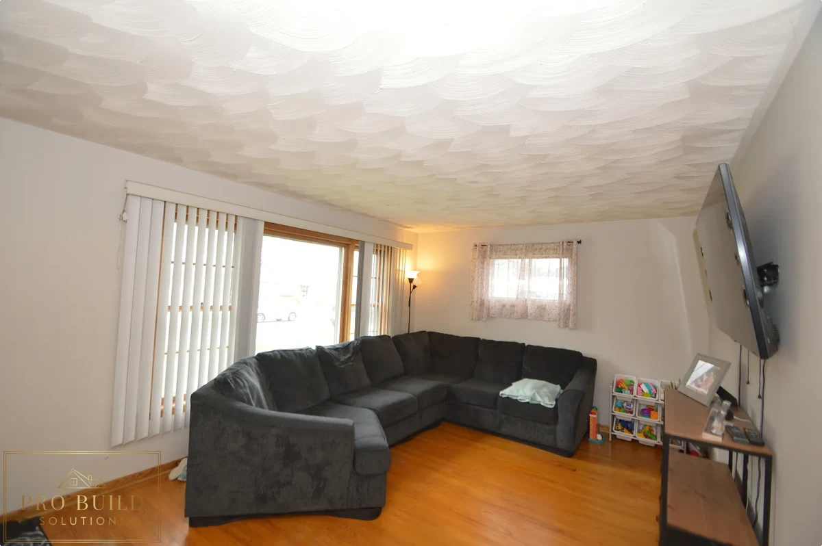 Living Room Original Flooring, Popcorn Ceiling, No Lighting, Western Springs