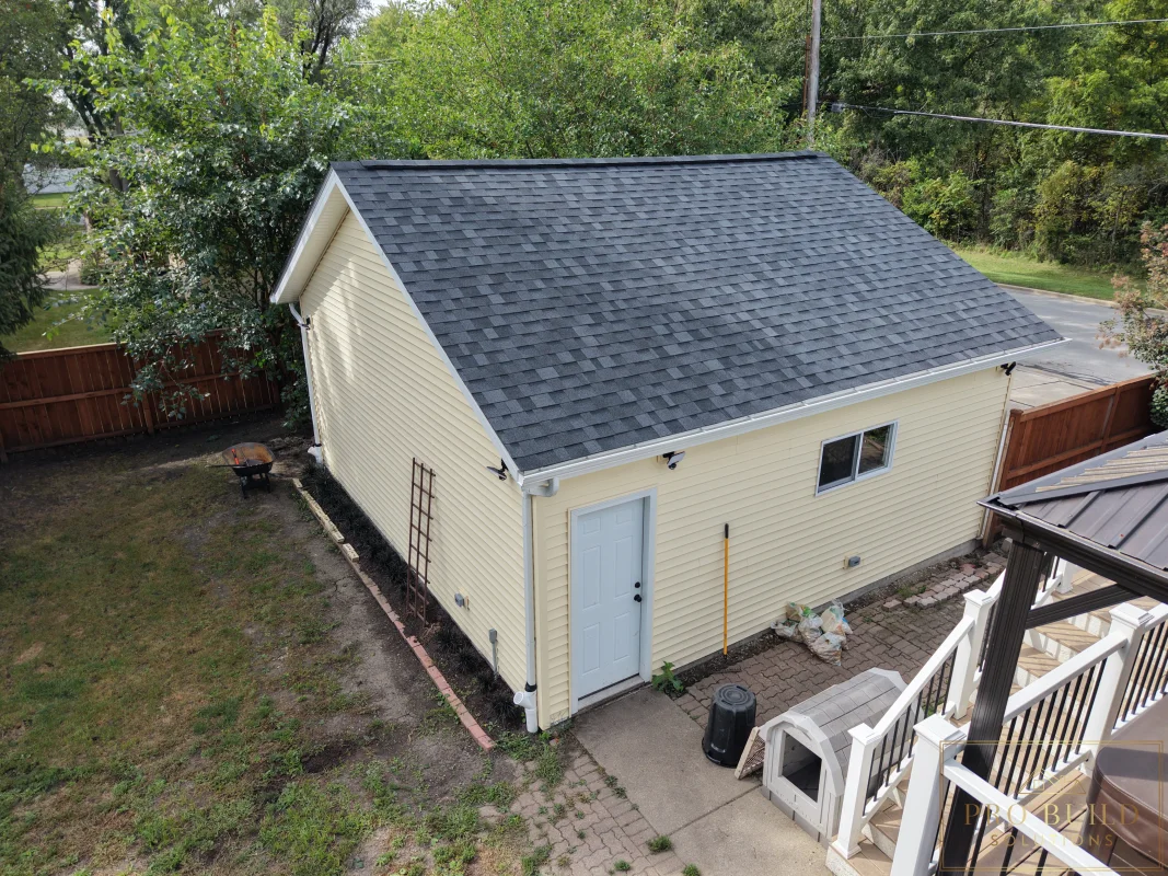 Completed garage side elevation after rebuild with updated exterior finishes, Wood Dale